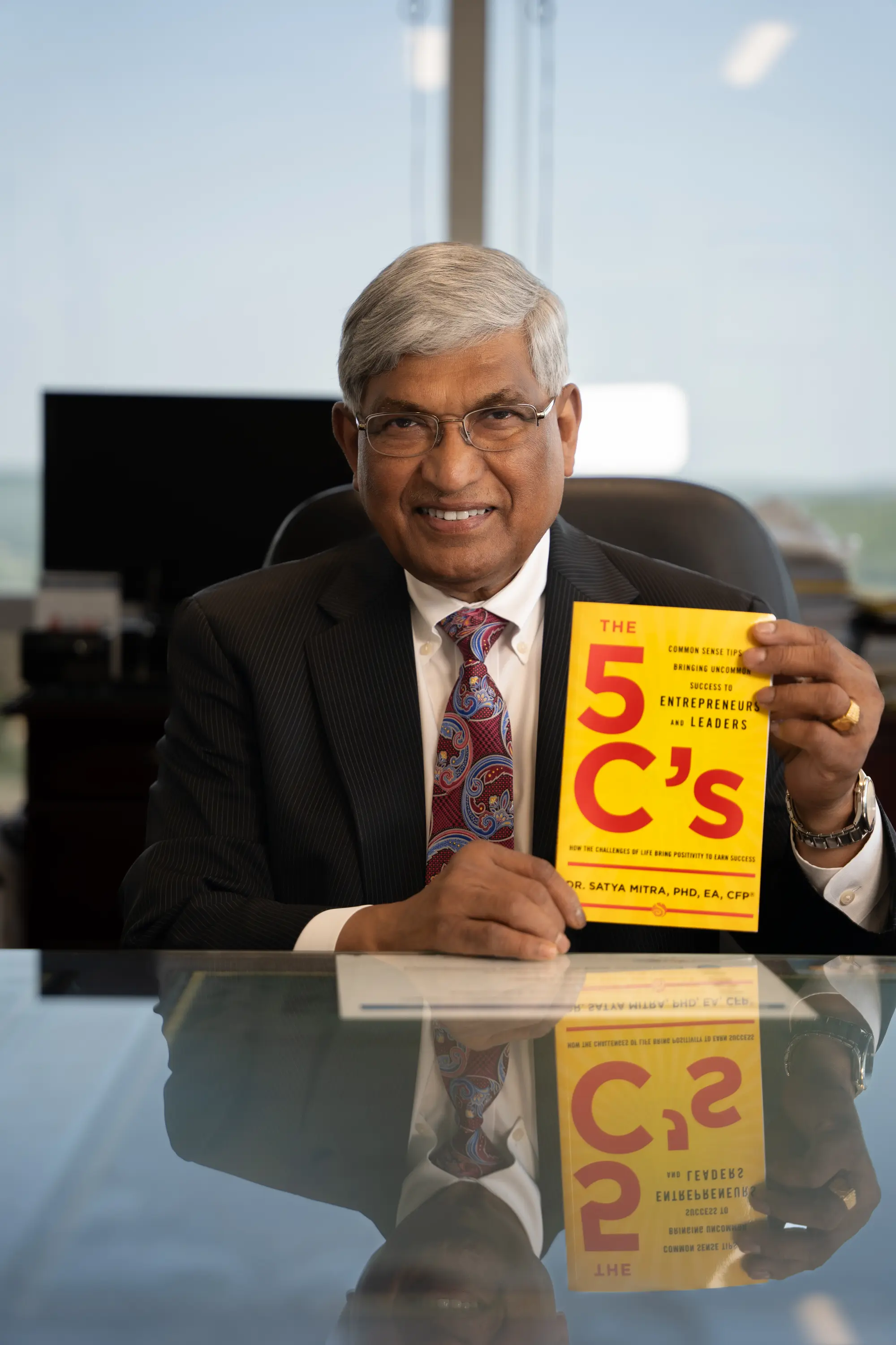 Dr. Satya Mitra
